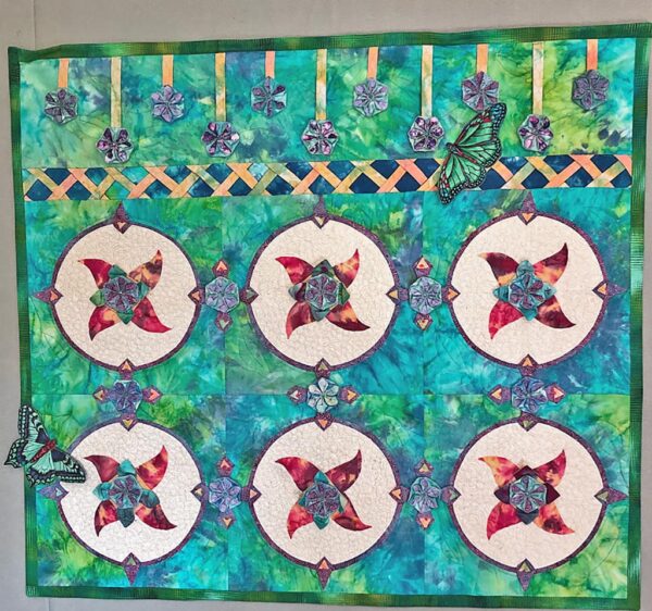 Jennifer Baker quilt in blues and greens