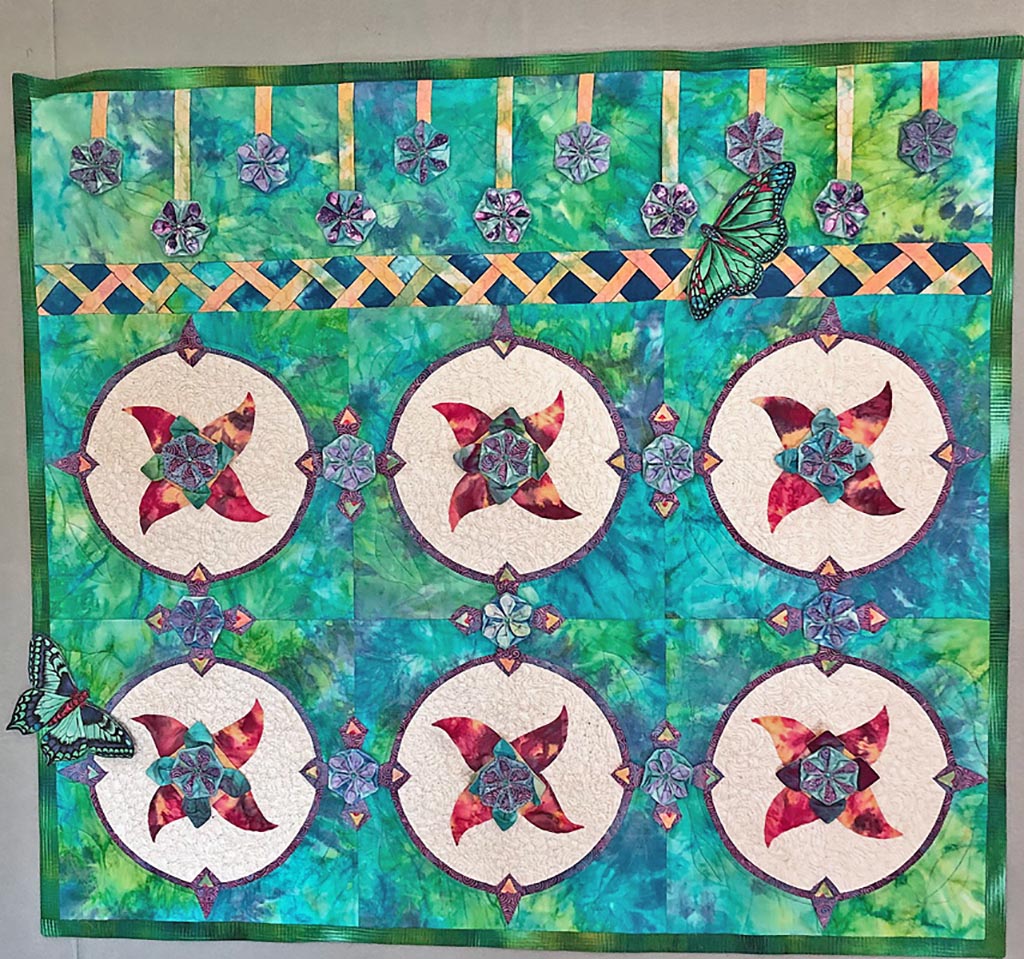 Jennifer Baker quilt in blues and greens