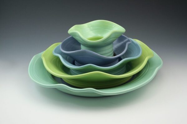 Marge Margulies set of five wavy ceramic dishes in blues and greens