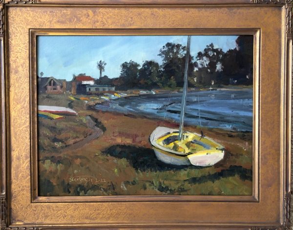 Sterlling Hoffman yellow lido boat beached on river's edge