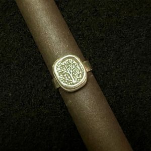 Frances Fuchs' sterling silver ring. A rustic natural formed tree imprint in sterling silver.