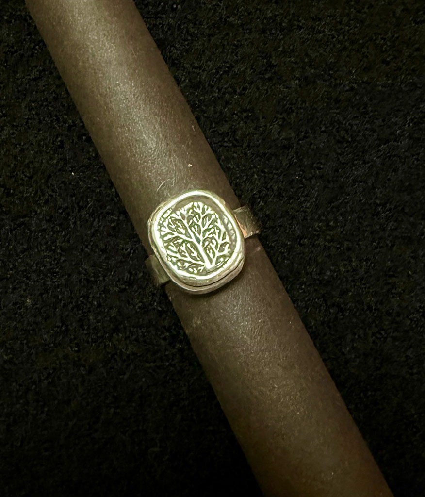 Frances Fuchs' sterling silver ring. A rustic natural formed tree imprint in sterling silver.