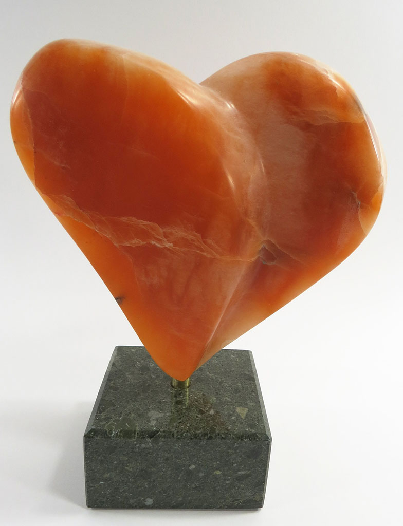 Rene Dayan-Whitehead's stone heart - orange alabaster on black marble base