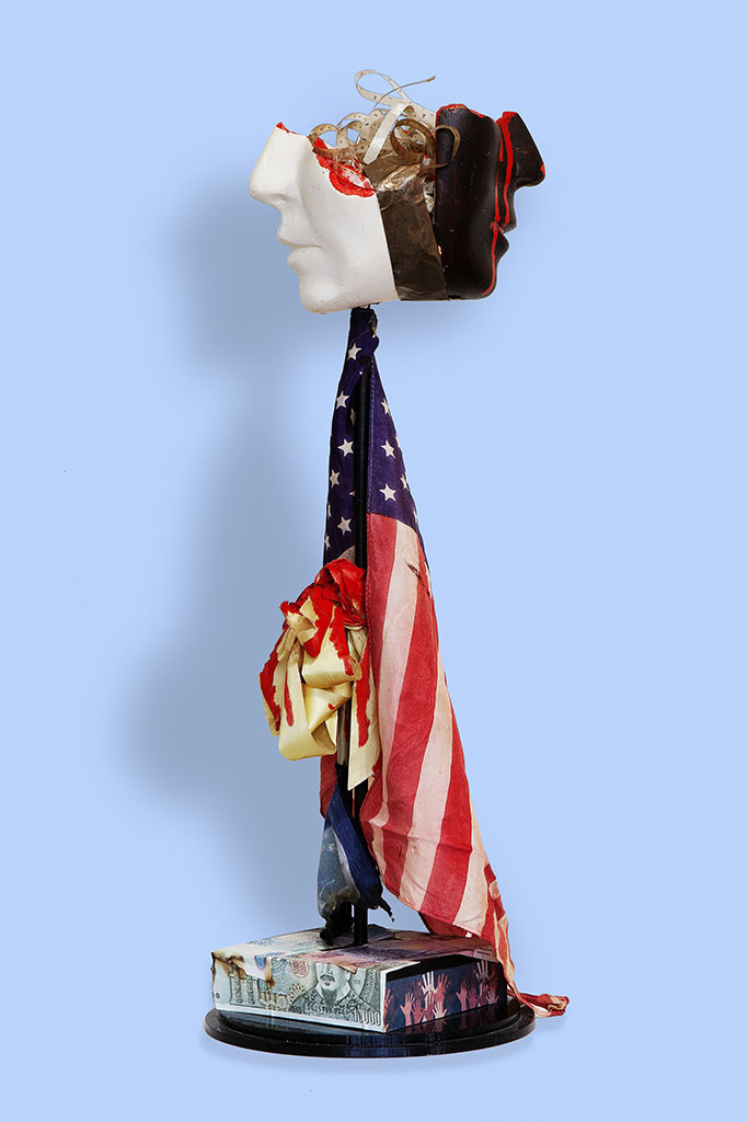 Susandra Spicer's assemblage sculpture with American flag and broken face