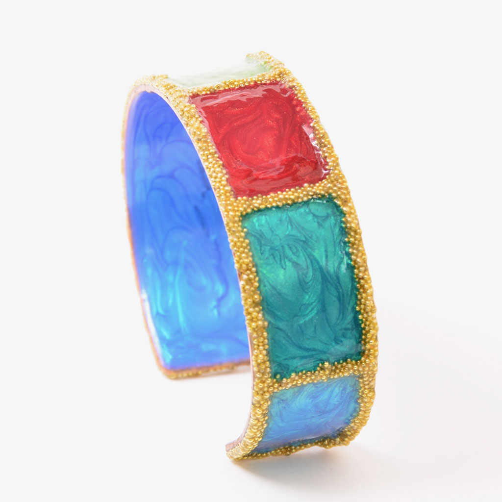 Ava Austin's Copper cuff enameled in pride colors with artist's proprietary technique, embellished with tiny glass marbles; fully adjustable and waterproof.