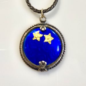 Anita Selinger's sterling silver with, blue vitreous enamel pendant with blue background and two gold stars, 18k and 24k gold