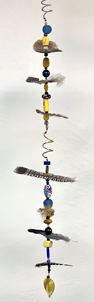 Deborah Reinerio's mobile of feathers and wire sculptures