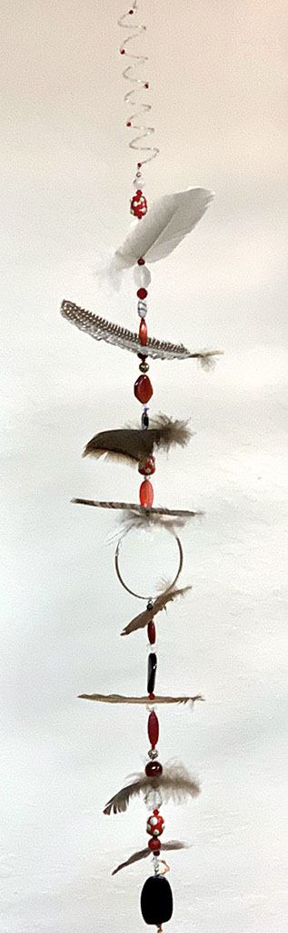 Deborah Reinerio's mobile of feathers and wire sculpture