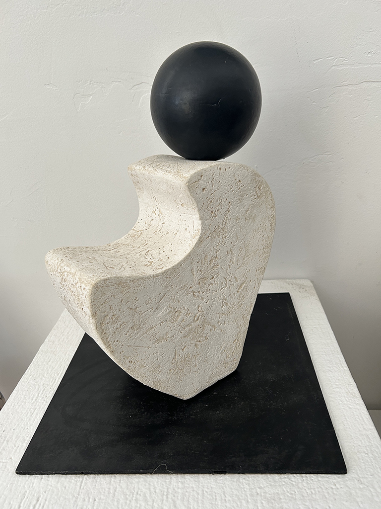 Joel Bennett's textured stoneware with black glazed sphere