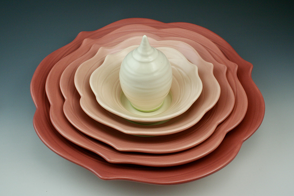 Marge Margulies thrown and altered functional ceramic centerpiece, inspired by plants in shades of pink