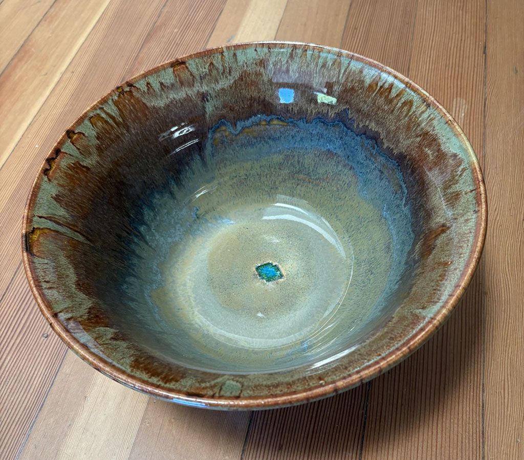 Larry Robinson's ceramic salad bowl in browns and green glazes