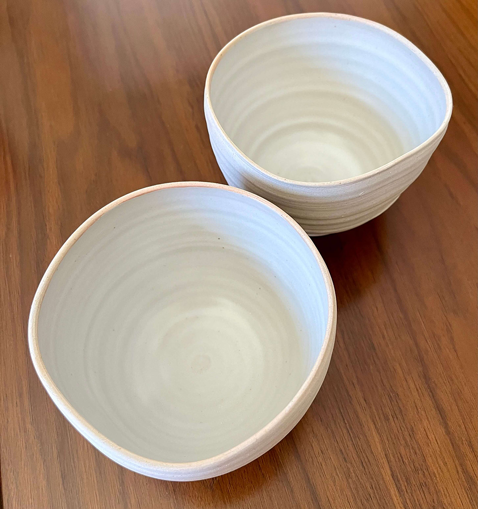 Roy Zajac's two white high fire ceramic bowls