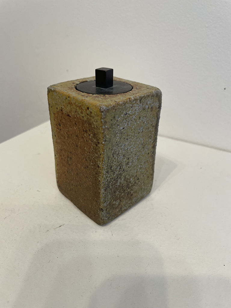 Bill Geisinger's contemporary woodfired, rectangular stoneware container with brass lid.